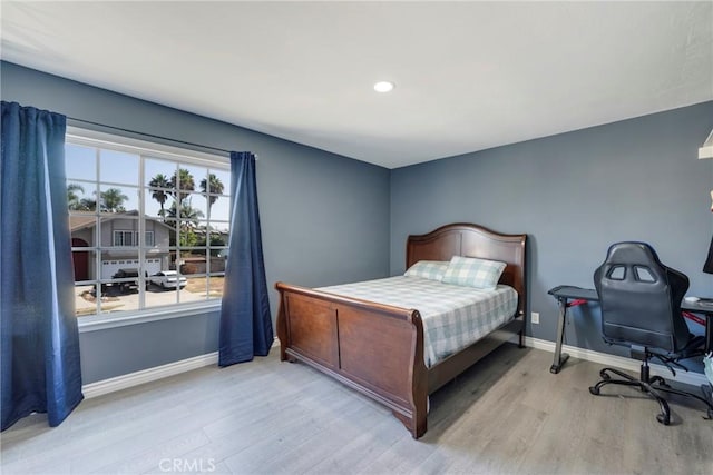 bedroom featuring light hardwood / wood-style flooring