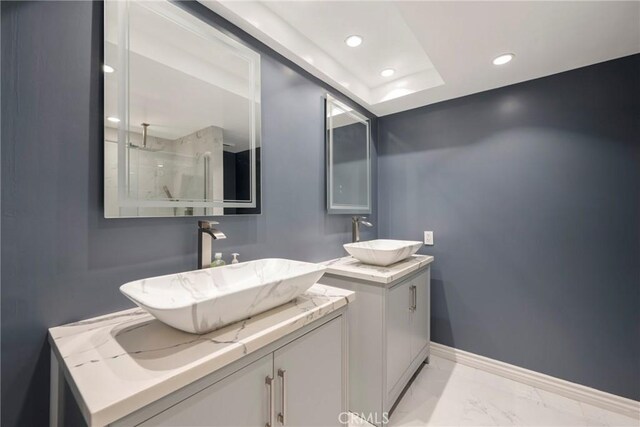 bathroom featuring vanity and walk in shower