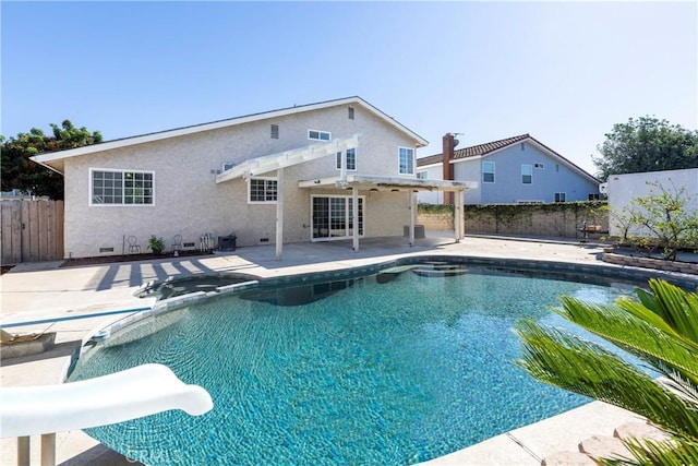 view of pool with a patio area and a water slide