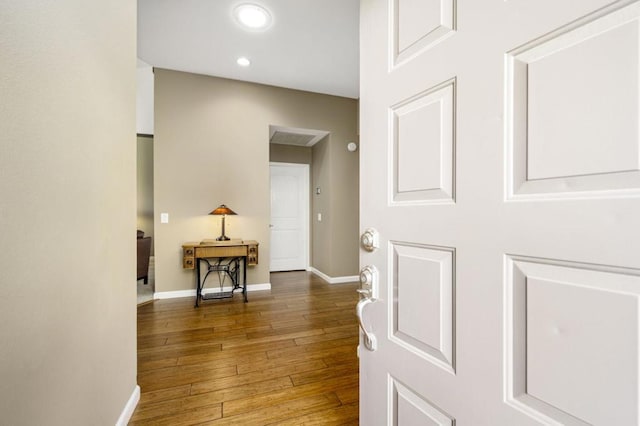 hall featuring dark wood-type flooring