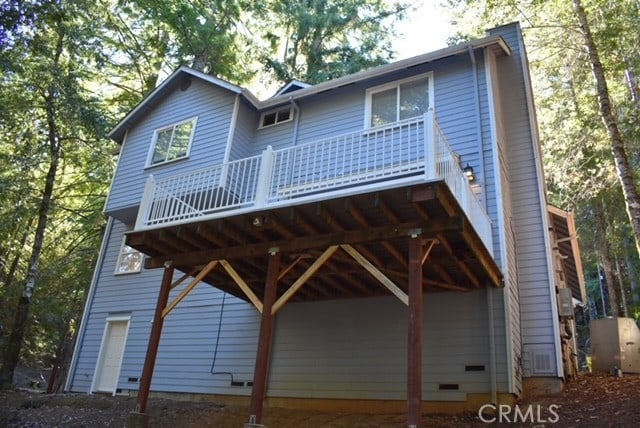 view of front of house with a deck