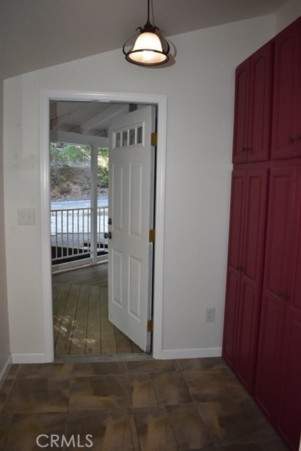 interior space featuring lofted ceiling