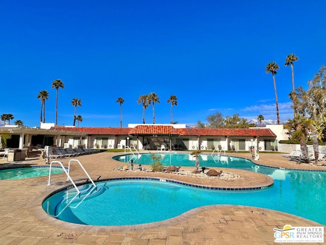 view of pool with a patio area