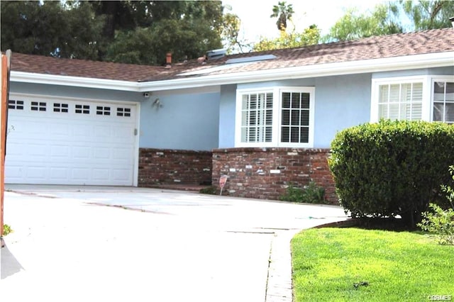 single story home with a garage