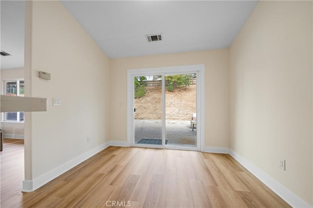 empty room with light wood-type flooring