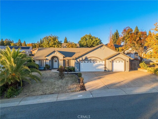 single story home with a garage