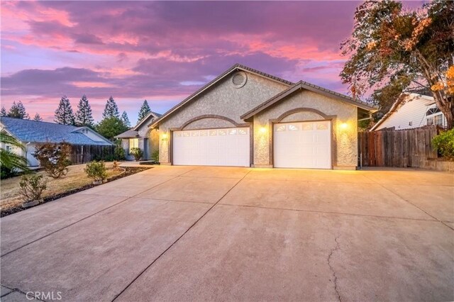 single story home with a garage