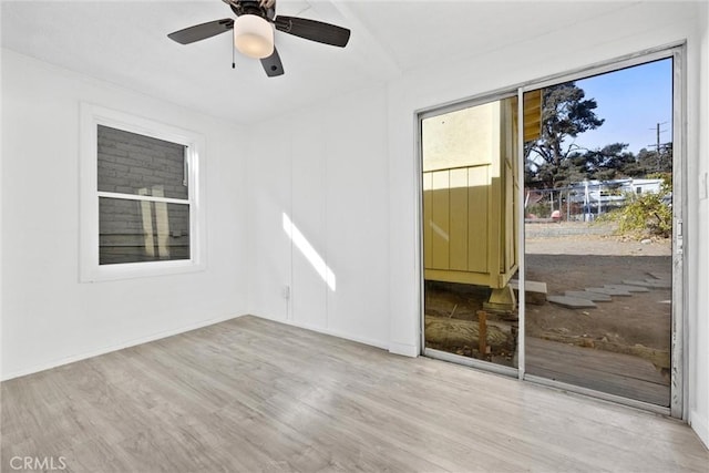 unfurnished room with light hardwood / wood-style flooring and ceiling fan