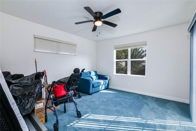 6050 Madden Ave, Los Angeles, CA 90043 - sitting room featuring carpet flooring, baseboards, and a ceiling fan