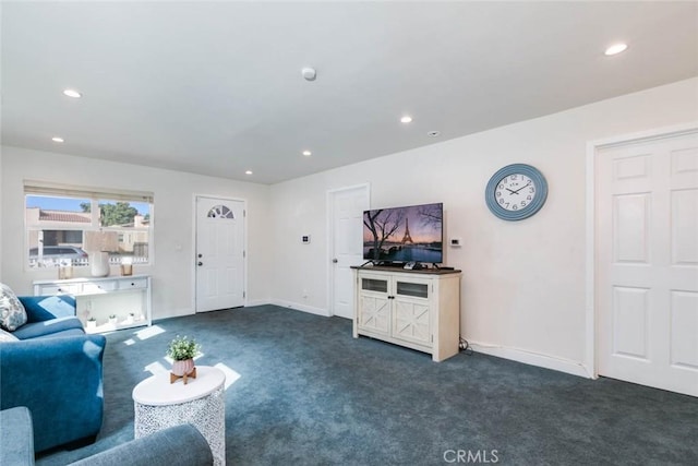 living room with dark carpet