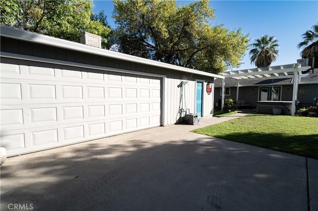 garage featuring a yard