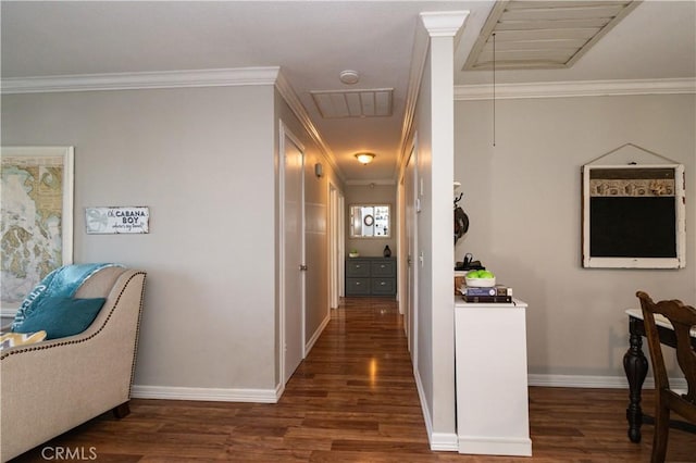 corridor featuring dark wood-type flooring and ornamental molding