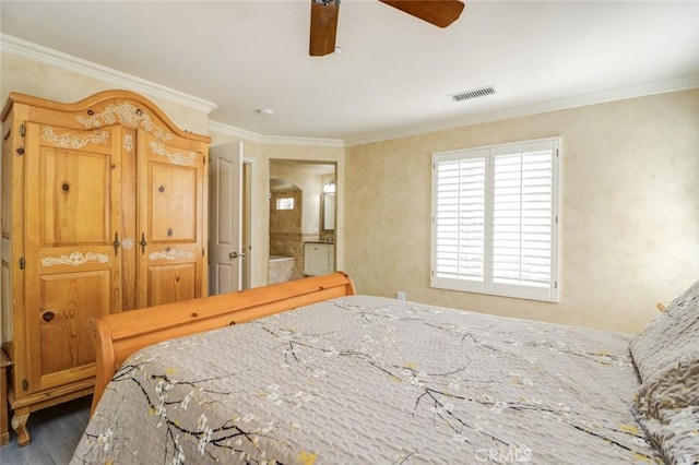 bedroom featuring dark hardwood / wood-style flooring, ceiling fan, and ornamental molding