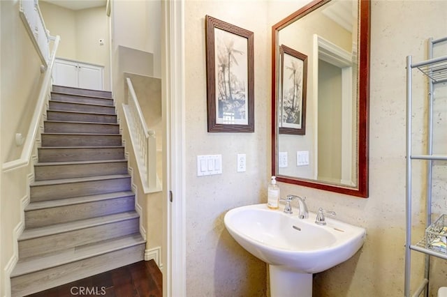 bathroom featuring hardwood / wood-style flooring and sink