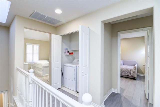 hallway featuring light hardwood / wood-style floors