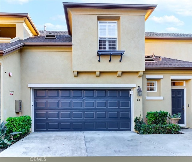 view of front of house with a garage