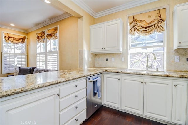 kitchen with dark hardwood / wood-style floors, white cabinetry, and sink