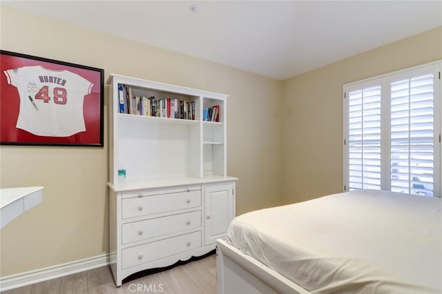 bedroom featuring light wood-type flooring