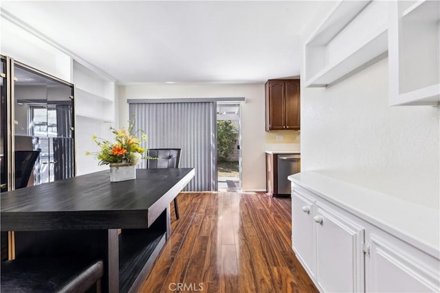 dining room with dark hardwood / wood-style floors