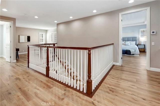 hall with light wood-type flooring