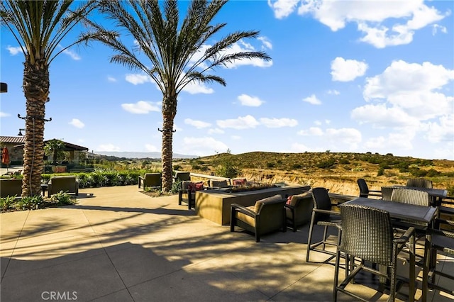 view of patio with a mountain view