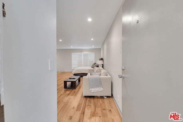 living room with light hardwood / wood-style flooring