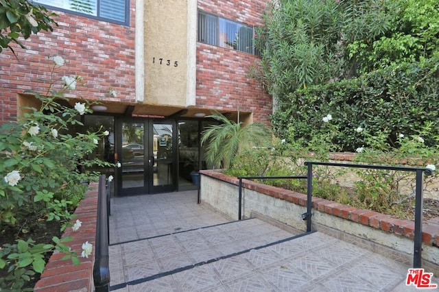 view of patio featuring french doors