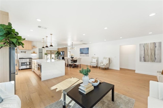 living room featuring light wood-type flooring