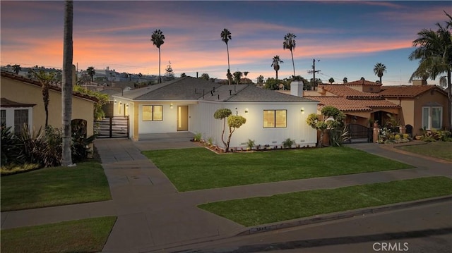 view of front of home featuring a yard