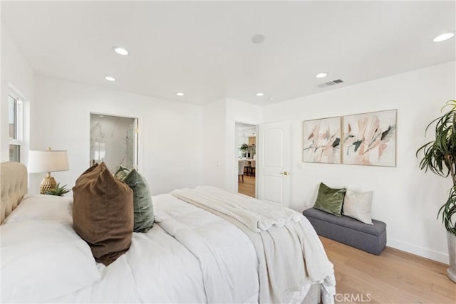 bedroom featuring light hardwood / wood-style floors