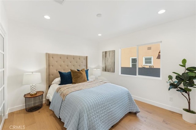 bedroom featuring light hardwood / wood-style flooring