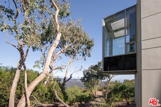 exterior space featuring a mountain view