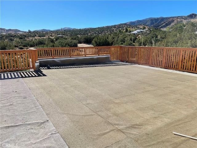 view of patio / terrace with a mountain view