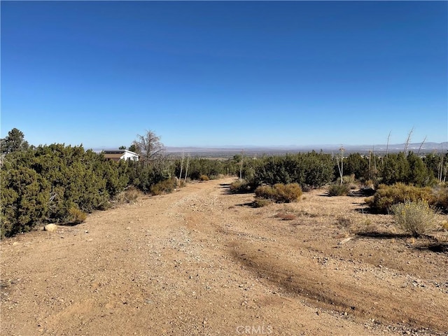 view of landscape with a rural view