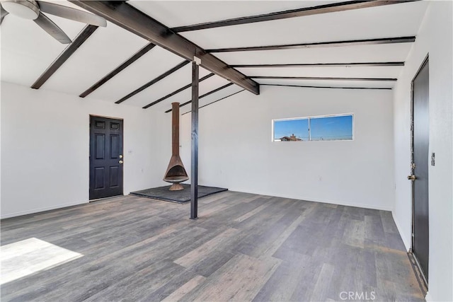 basement featuring hardwood / wood-style flooring and ceiling fan