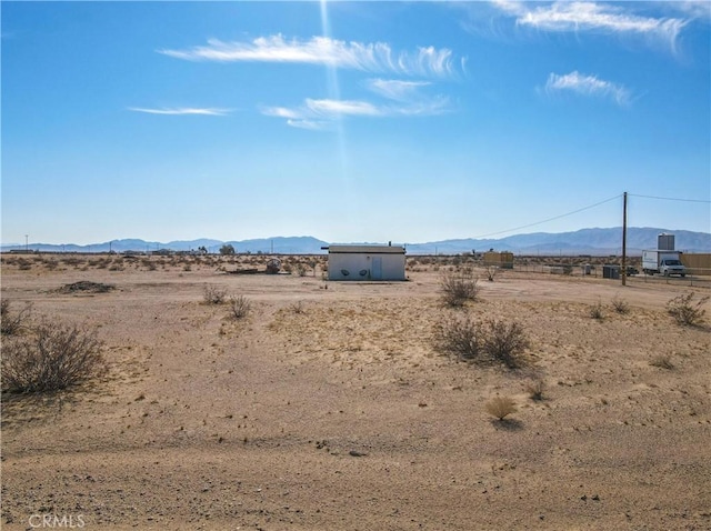 view of mountain feature featuring a rural view