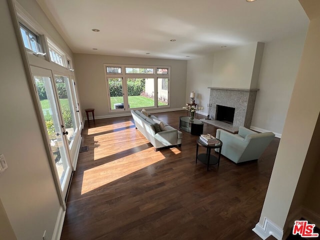 living room with dark hardwood / wood-style floors