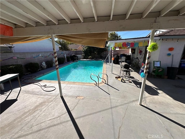 view of pool with a patio area