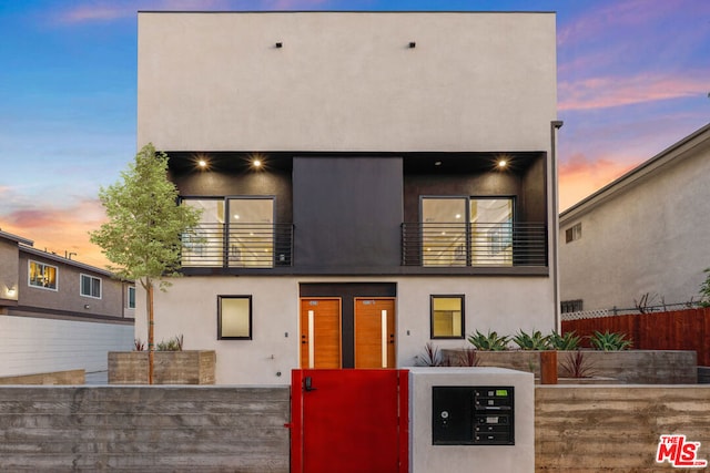 modern home featuring a balcony