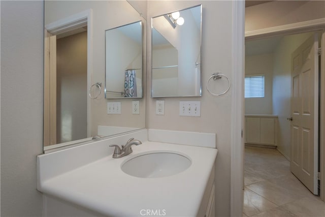 bathroom with vanity and tile patterned flooring