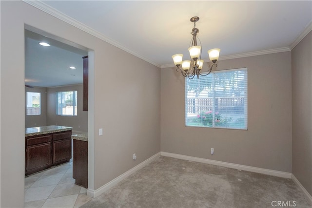 empty room with crown molding, light colored carpet, and a notable chandelier