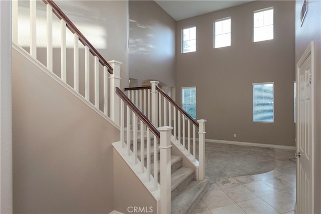 foyer featuring a high ceiling