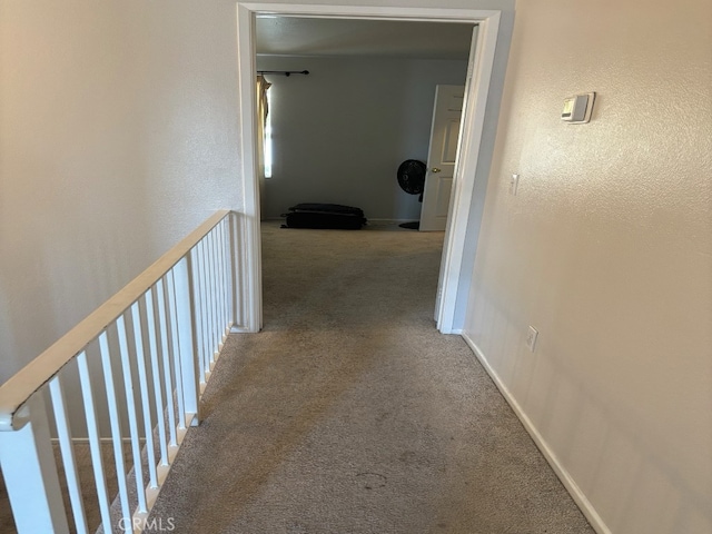 corridor with carpet floors