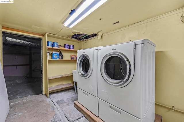 laundry area with washer and dryer