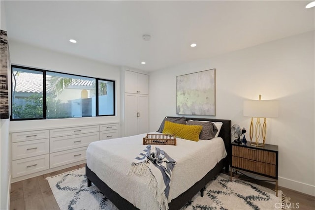 bedroom featuring light wood-type flooring