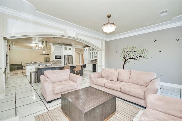 living room with ornamental molding