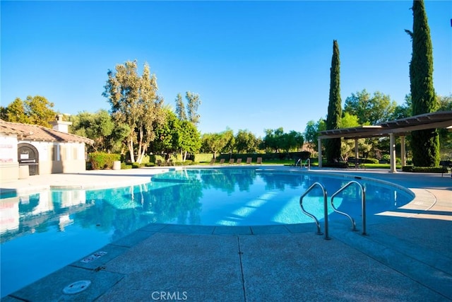 view of pool with a patio