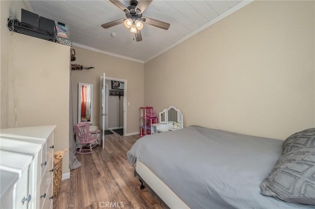 bedroom featuring ceiling fan, wooden ceiling, crown molding, and hardwood / wood-style floors