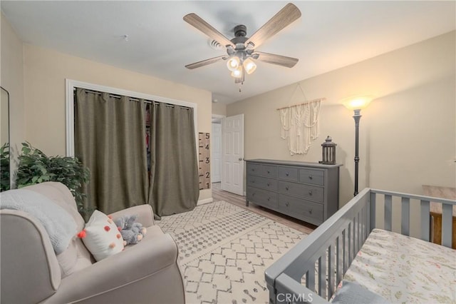 bedroom featuring ceiling fan and light hardwood / wood-style floors