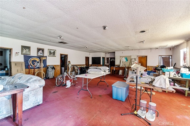 miscellaneous room featuring a textured ceiling